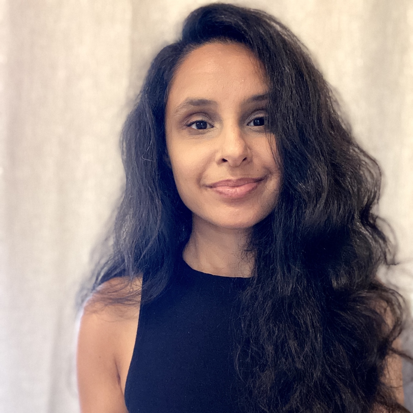 Headshot of Nisha Gupta