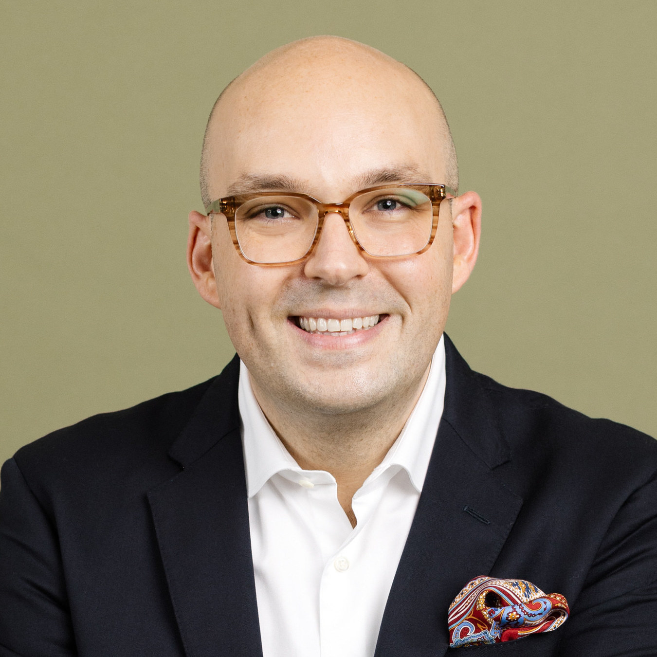 Headshot of Dr. Justin R. Garcia, evolutionary biologist, author, and Executive Director of the Kinsey Institute