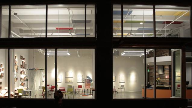 Desai Matta Gallery through Glass Windows at Night