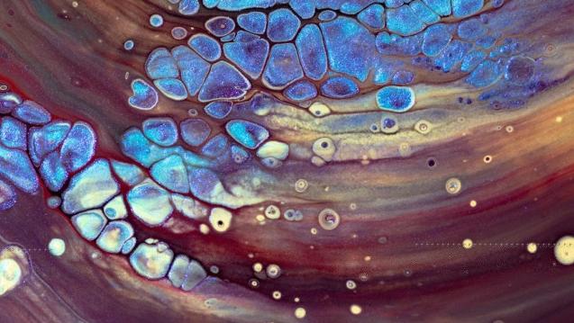 Colorful swirled art with bubbles.