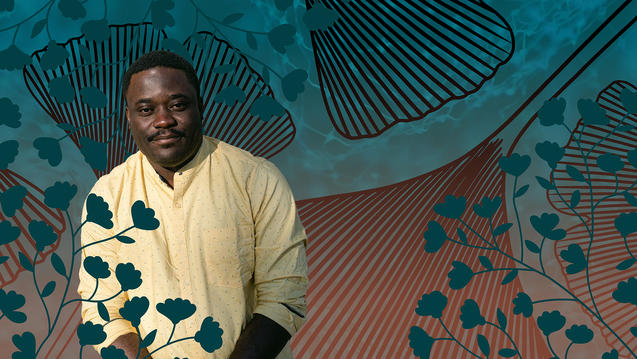 Bayo Akomolafe color potrait. Bayo is rooted with the Yoruba people in a more-than-human world. He is a dark-skinned man with short dark hair, is smiling, and wearing a light yellow button-down it subtle dots. Surrounding him is graphic illustration of ginko leaves and flowers in dark and light green and orange.