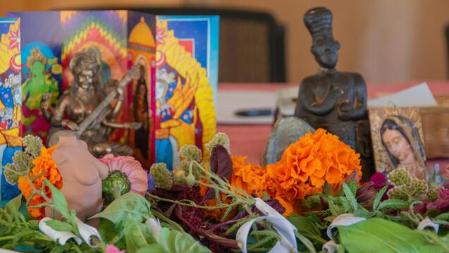 Altar of spiritual figures and flowers