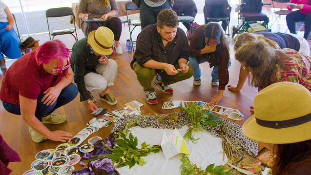 Class crouched down around altar
