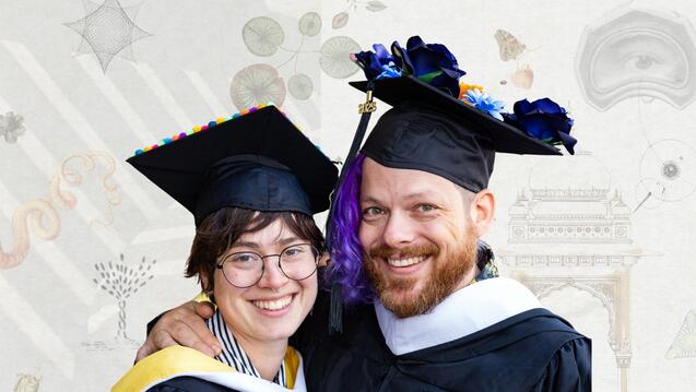 Photo of two graduate students smiling