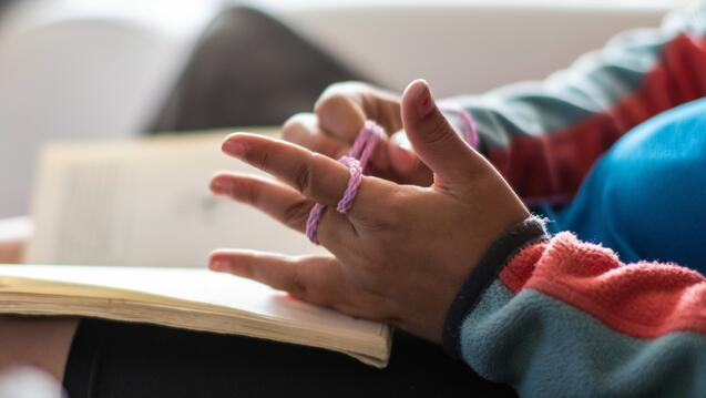 Person holding book