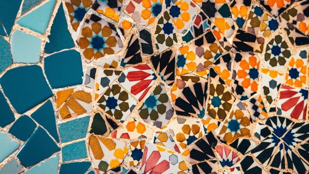 mosaic tiles with blue, orange, red, yellows, and browns
