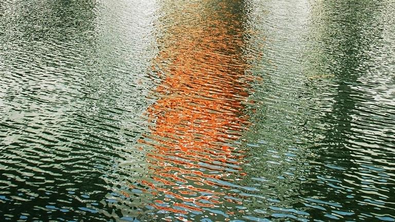 light on a river reflecting