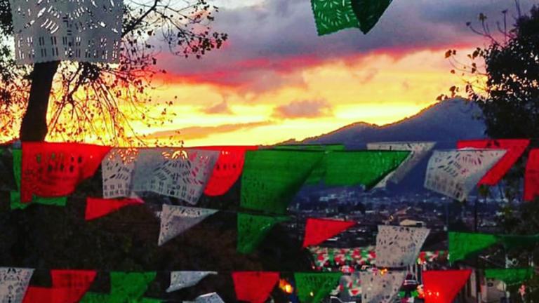 Green, red, and white flags in the autonomous Zapatistas territory in Chiapas, Mexico. The Transformative Leadership online Master's program at California Institute of Integral Studies presents a model of leadership focused on social justice and equity.