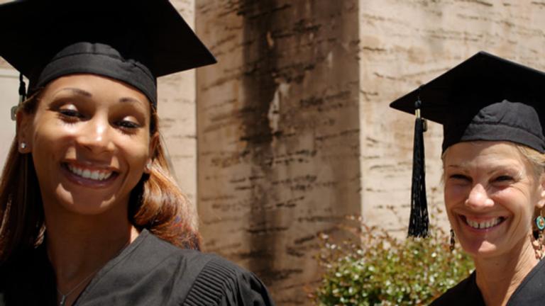 Students wearing they gowns and hats at their commencement ceremony. Learn more about the MFA at California institute of Integral Studies, CIIS, in San Francisco, CA