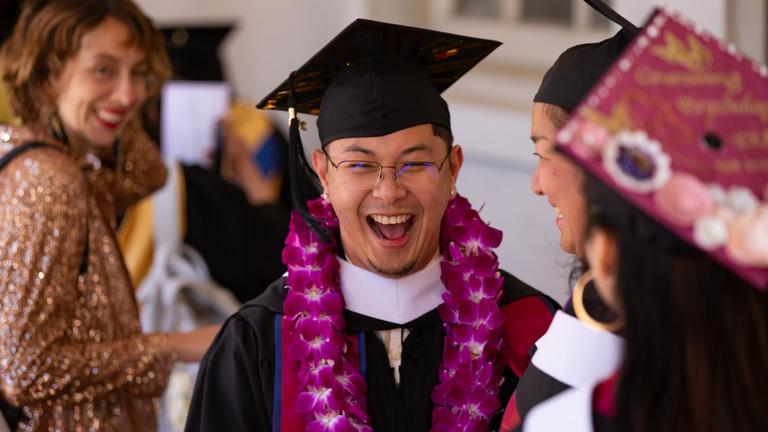 CIIS graduate smiling