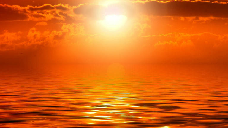 Photo of a sunset over water, with clouds in the sky. Find out more about the Integrative Health online M.A. program at California Institute of Integral Studies (CIIS)