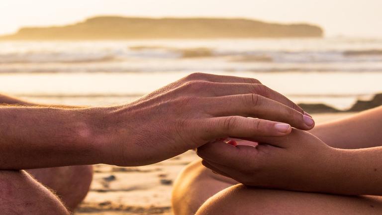 Photo of clasped hands