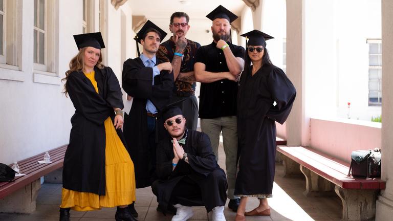 CIIS graduates posing as their program