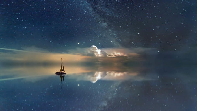 Photo of sailing into a starry sky