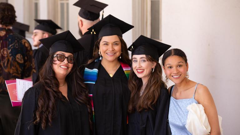 Photo of graduates in cap and gown