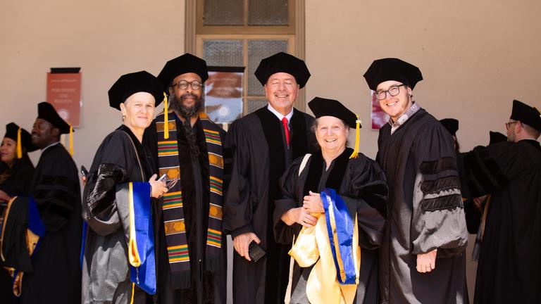 Graduates in courtyard