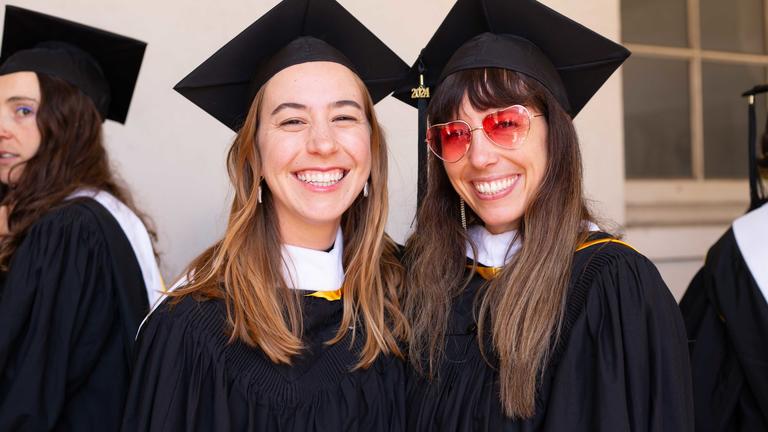 Two graduates