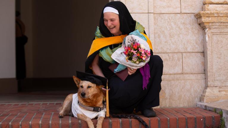 Graduate with dog