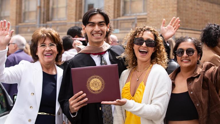 Graduate with family