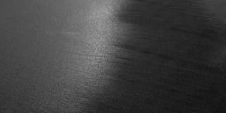 Photo of light reflecting on the ocean