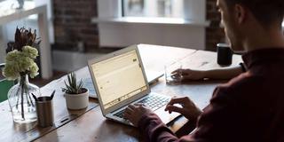 Photo of person typing on a laptop by Bench Accounting on Unsplash