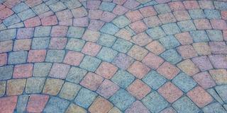 Photo of colorful bricks laid in an arch pattern