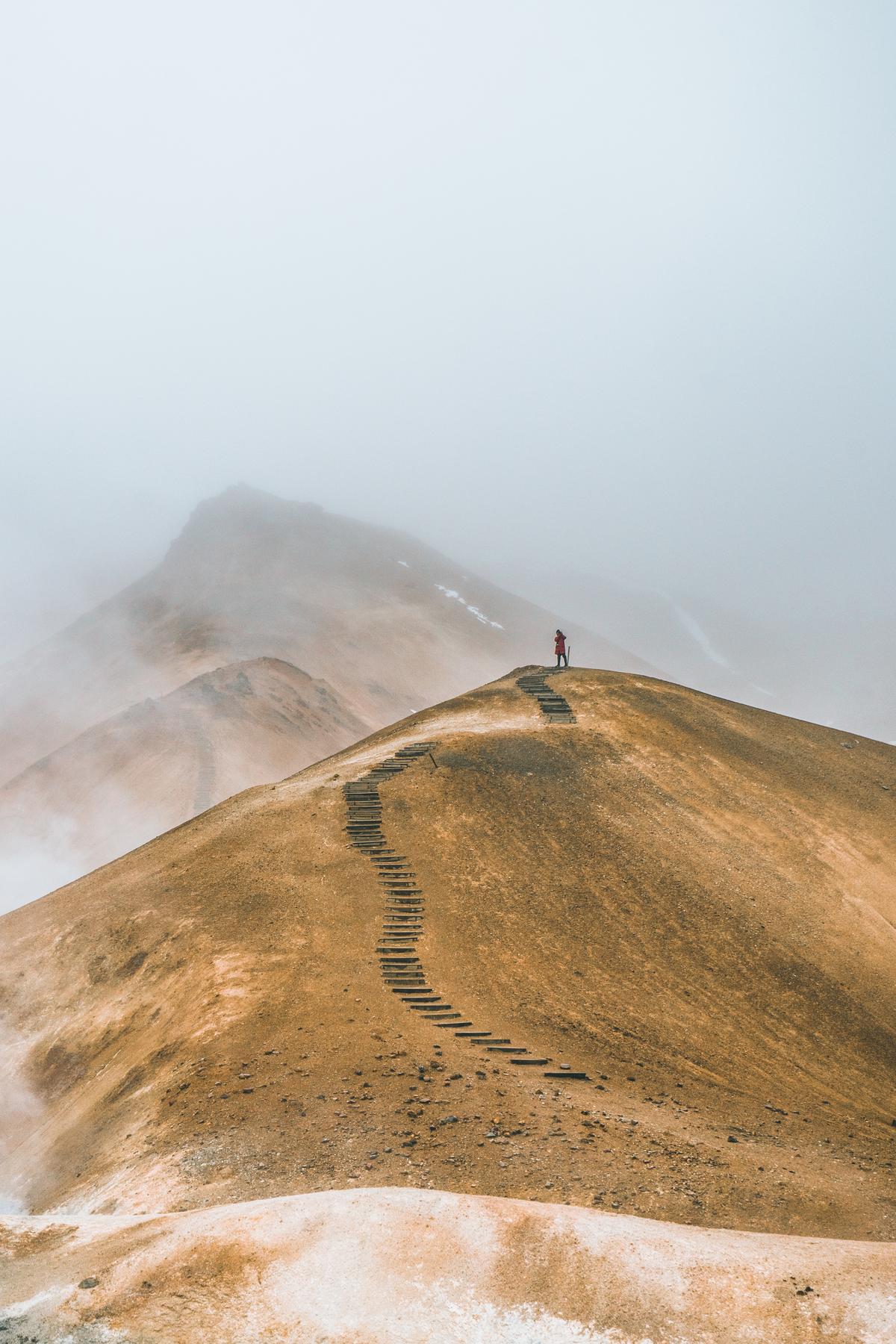 Person walking up a hill