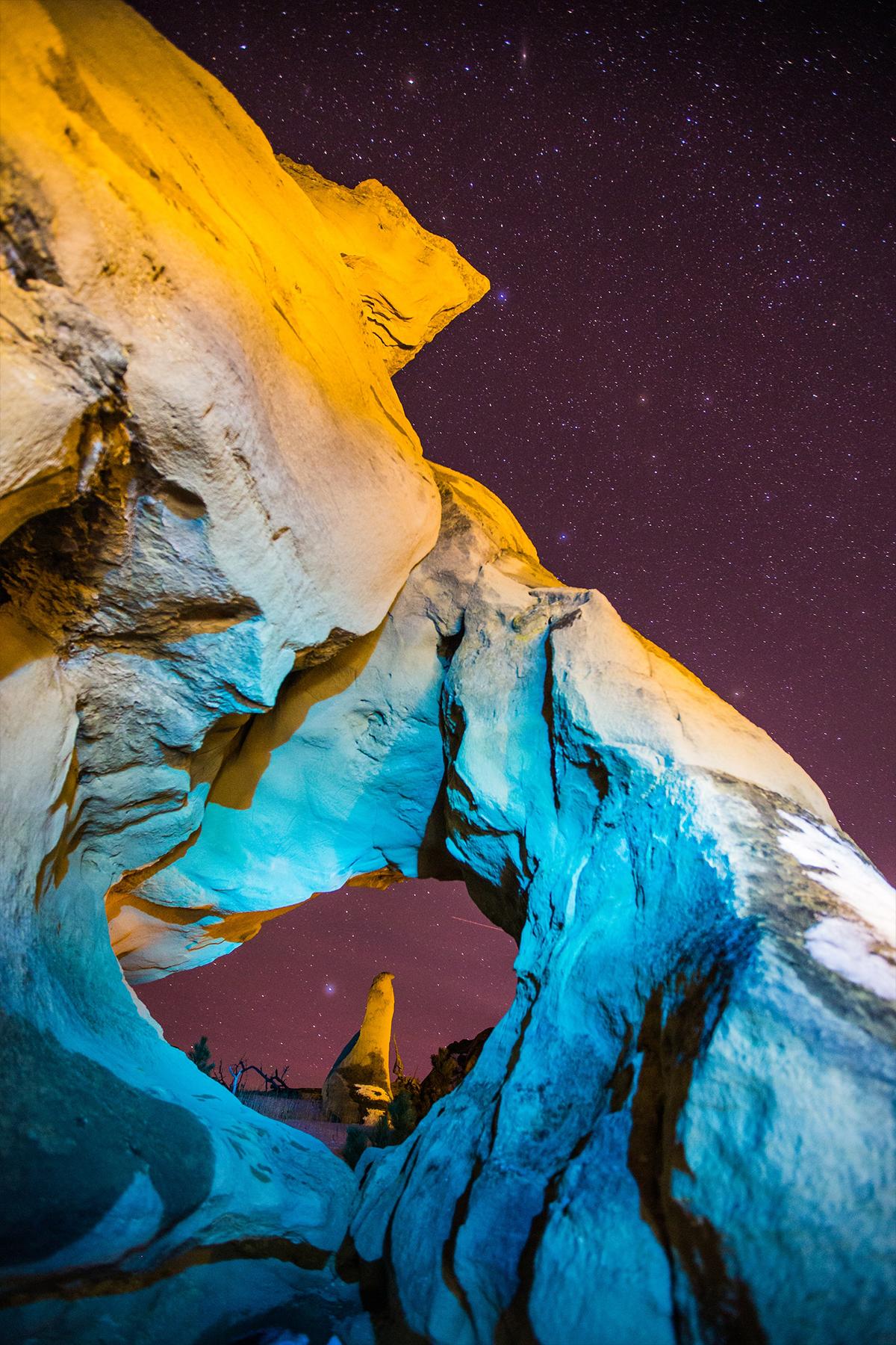 Night sky and rock by Daniel Lloyd