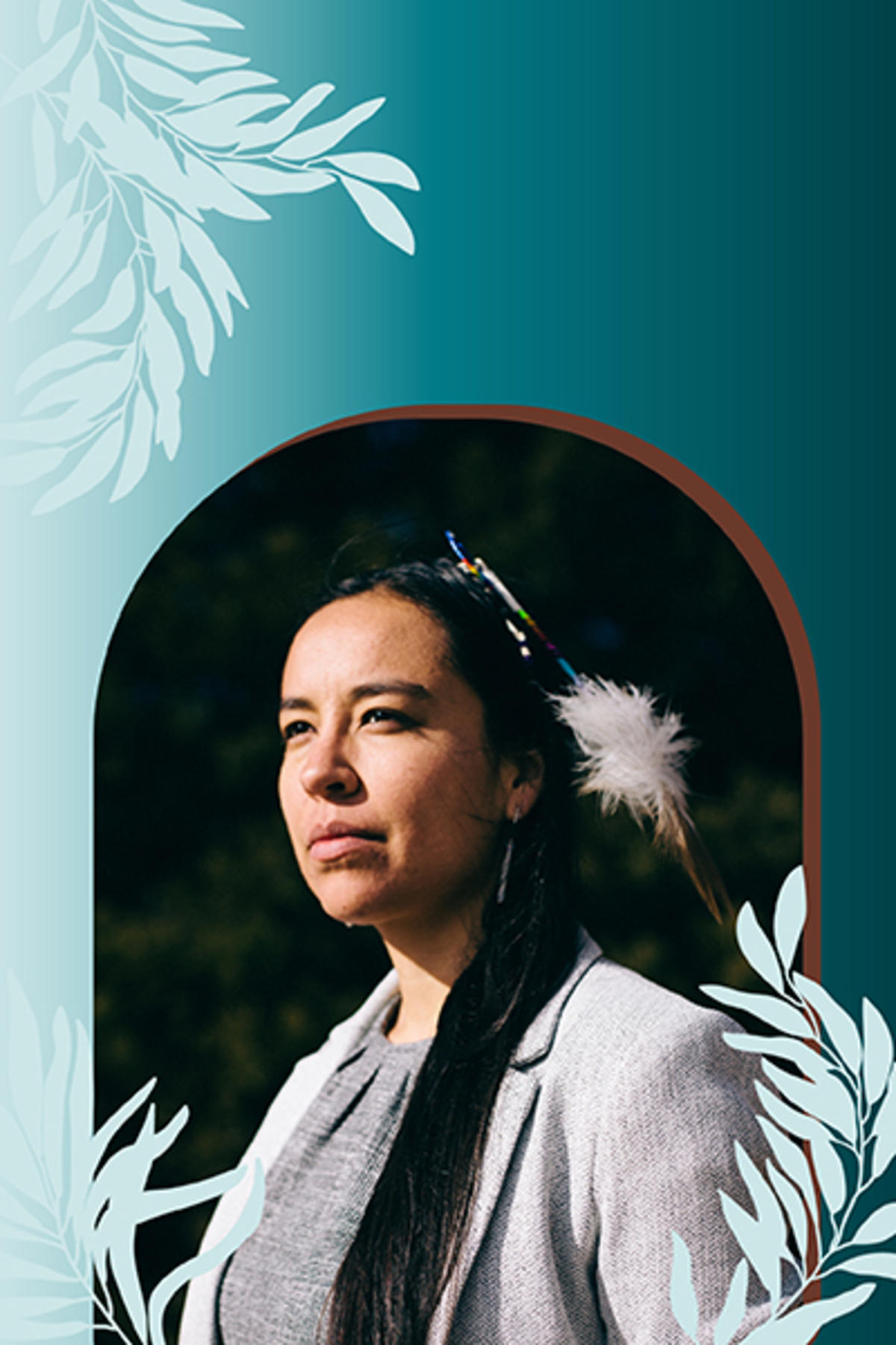 Lyla June color portrait. Lyla is Diné (Navajo), Tsétsêhéstâhese (Cheyenne), and European lineages. She is looking off to the far left and is in partial profile. She is wearing beads and feathers from her cultural communities in her long, dark-colored hair. She is also wearing light gray colored blazer and top. Behind her appears to be greenery so this photo may have been taken outside.
