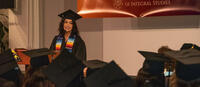 Student speaking at CIIS' 2022 Commencement Ceremony