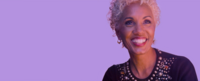 Deb Santana with a light purple background