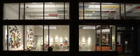 Desai Matta Gallery through Glass Windows at Night