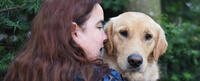 Master of Fine Arts program graduate, Maia Scott and her dog, Gleam.