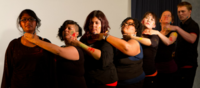 Members of Theatre for Change performing on stage. Find out more about the Master of Art in Counseling Psychology with concentration in Drama Therapy at California Institute of Integral Studies, CIIS, in San Francisco, CA.