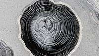 Photo of a black and white painted spiral