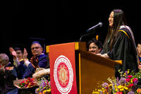 Integral Counseling Psychology graduate Marissa Huang delivers a student reflection at CIIS' 57th Commencement Ceremony.
