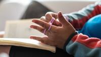 Person holding book
