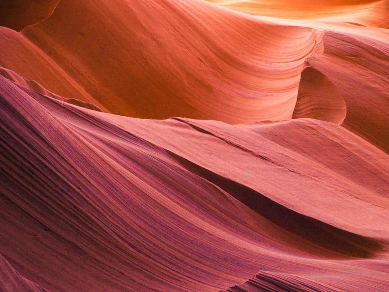 Red desert mountain ridge photo. By Meric Dagli on Unsplash
